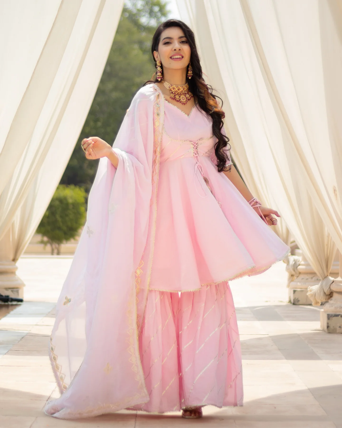 PINK RHYTHM GOTA SHARARA SET WITH GOTA POTLI